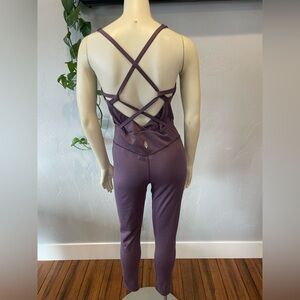 Free people movement hot shot, strappy onesie in mauve/purple size M